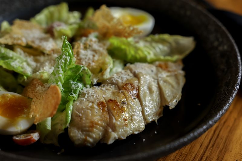 Caesar salad with romaine, parmesan crisps and house dressing